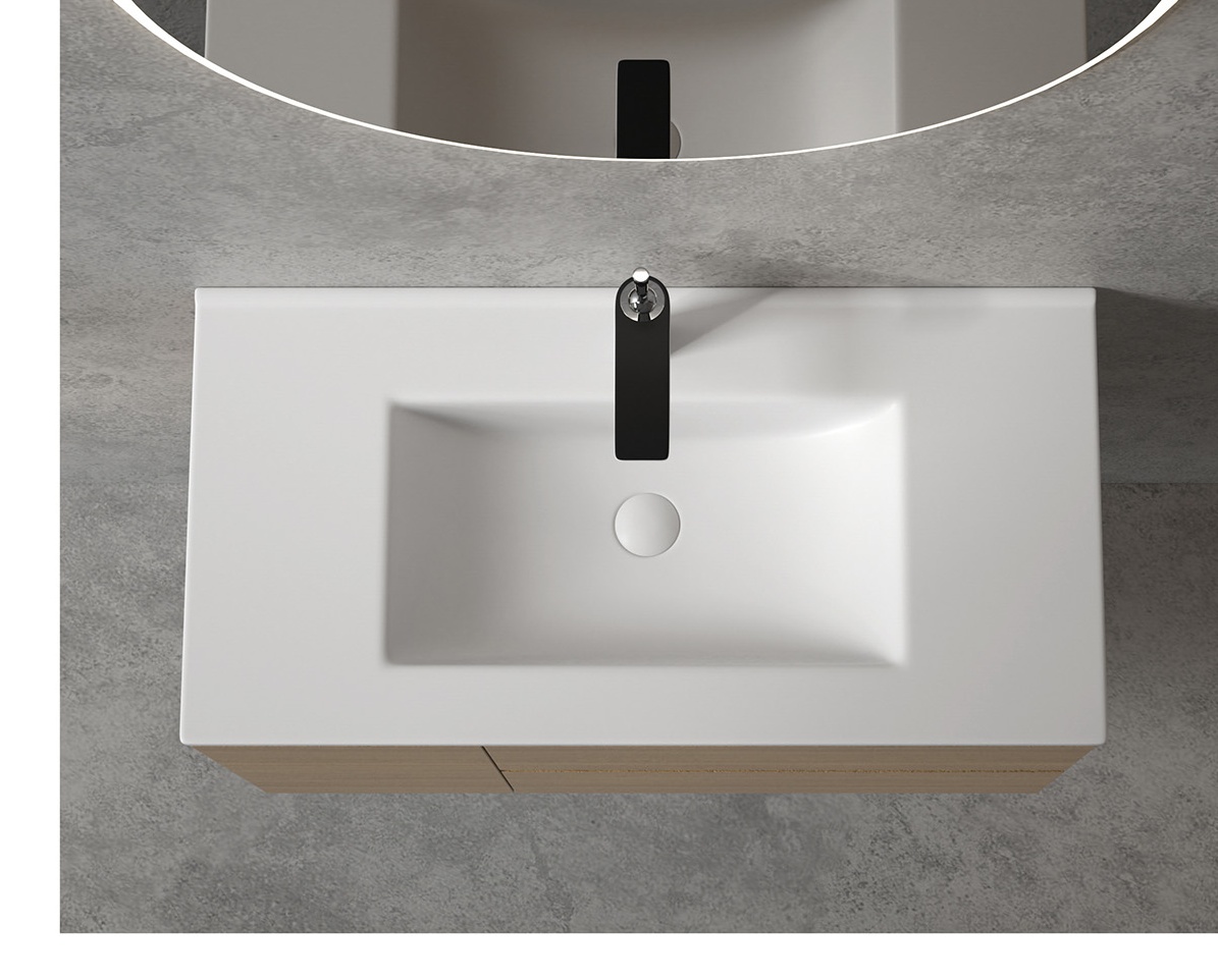 Ceramic basin installed above a bathroom cabinet